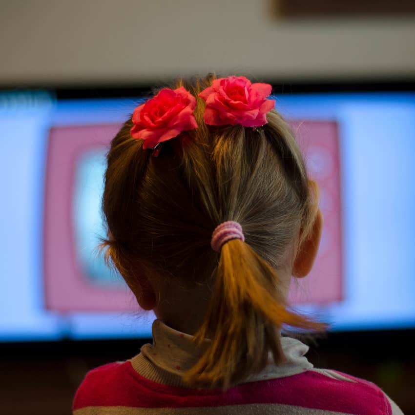 young girl watching movie about romance
