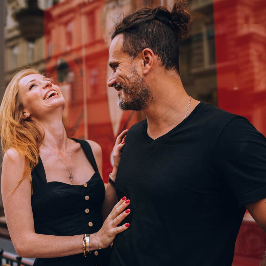 woman in lust laughing with man