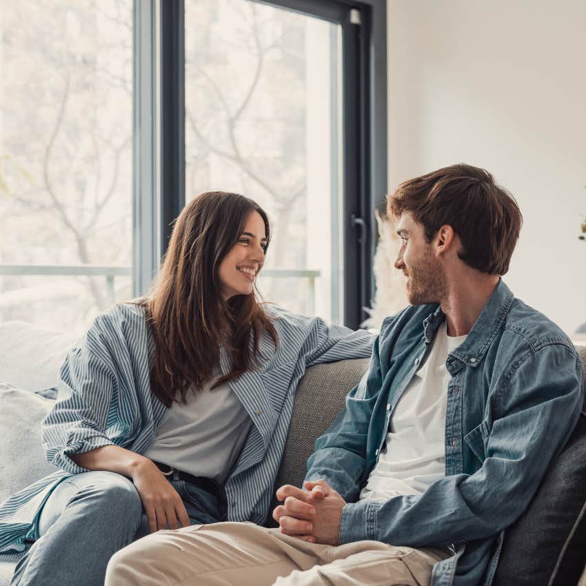 woman in love smiling next to man