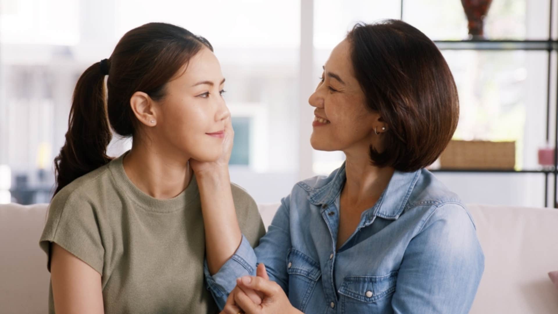 woman talking to mom in order to keep the peace 