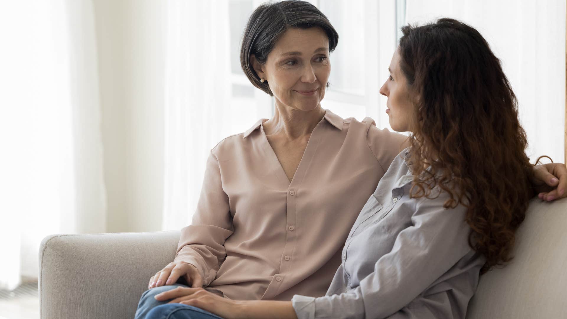 woman telling her adult daughter she has great taste