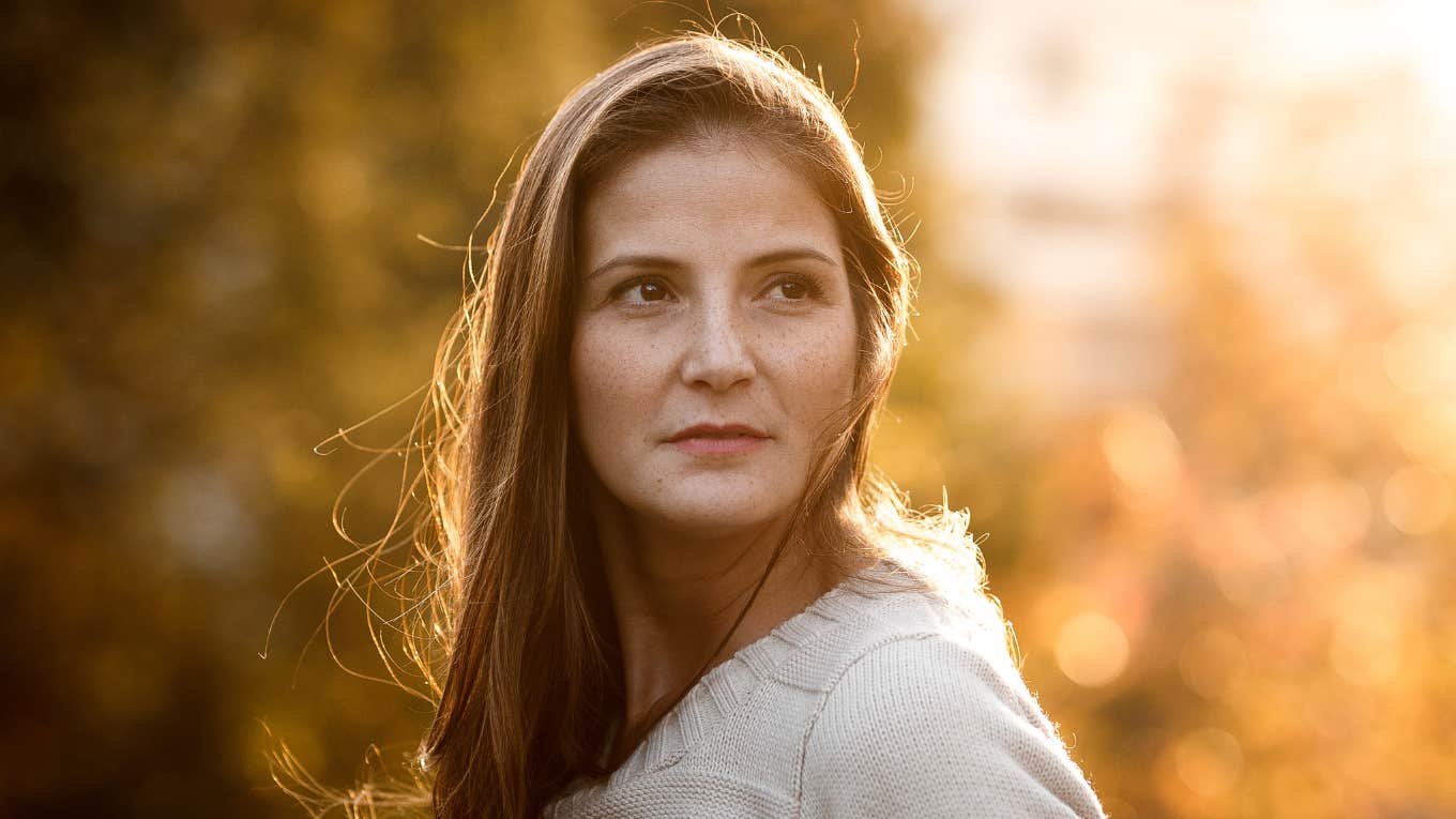 Small Behaviors That Mean A Woman's Unhappy In Her Marriage, According To Experts Woman is unhappy in her marriage.