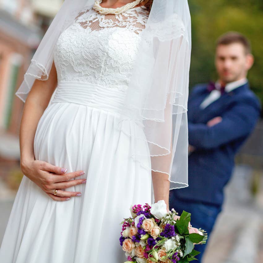 bride who is pregnant on her wedding day