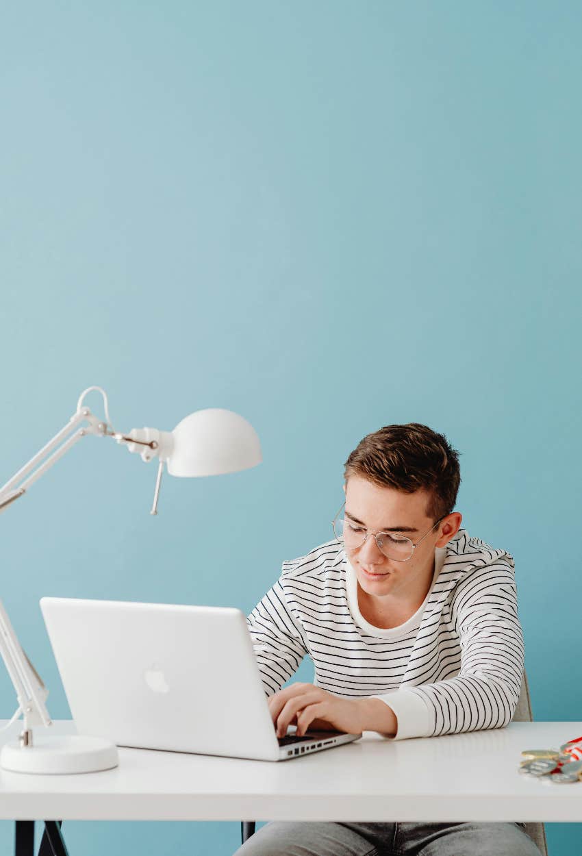 teenage boy on computer