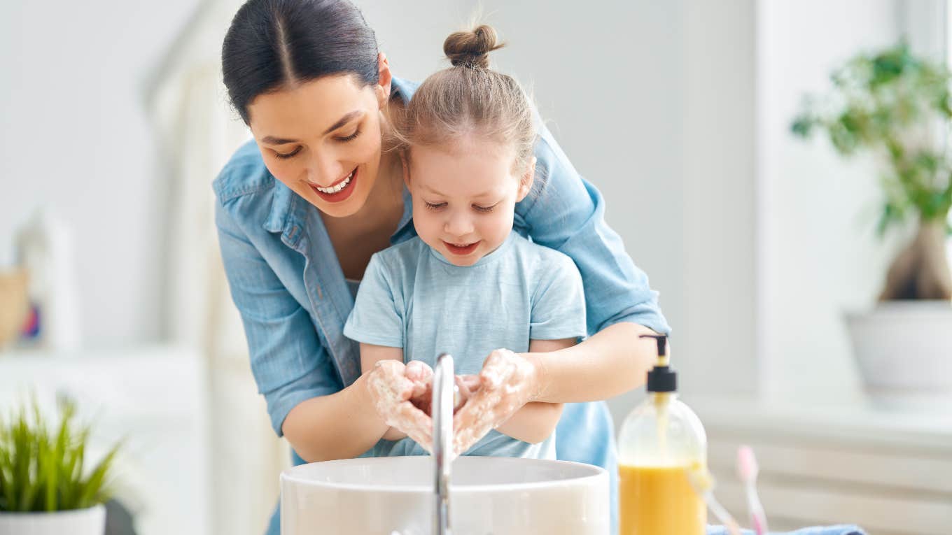 It's Concerning How Many Adults Don't Wash Their Hands mom teaching her daughter how to wash her hands