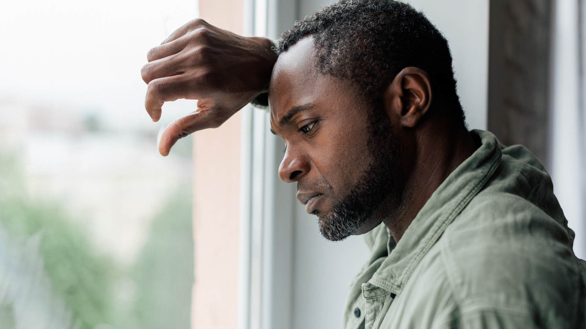 sad depressed man unable to celebrate his accomplishments