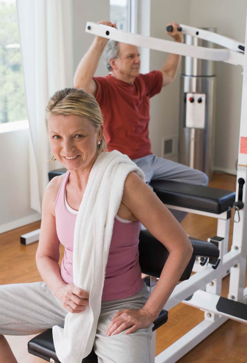 Couple enjoying their new gym instead of spending to renovate separate bedrooms for kids