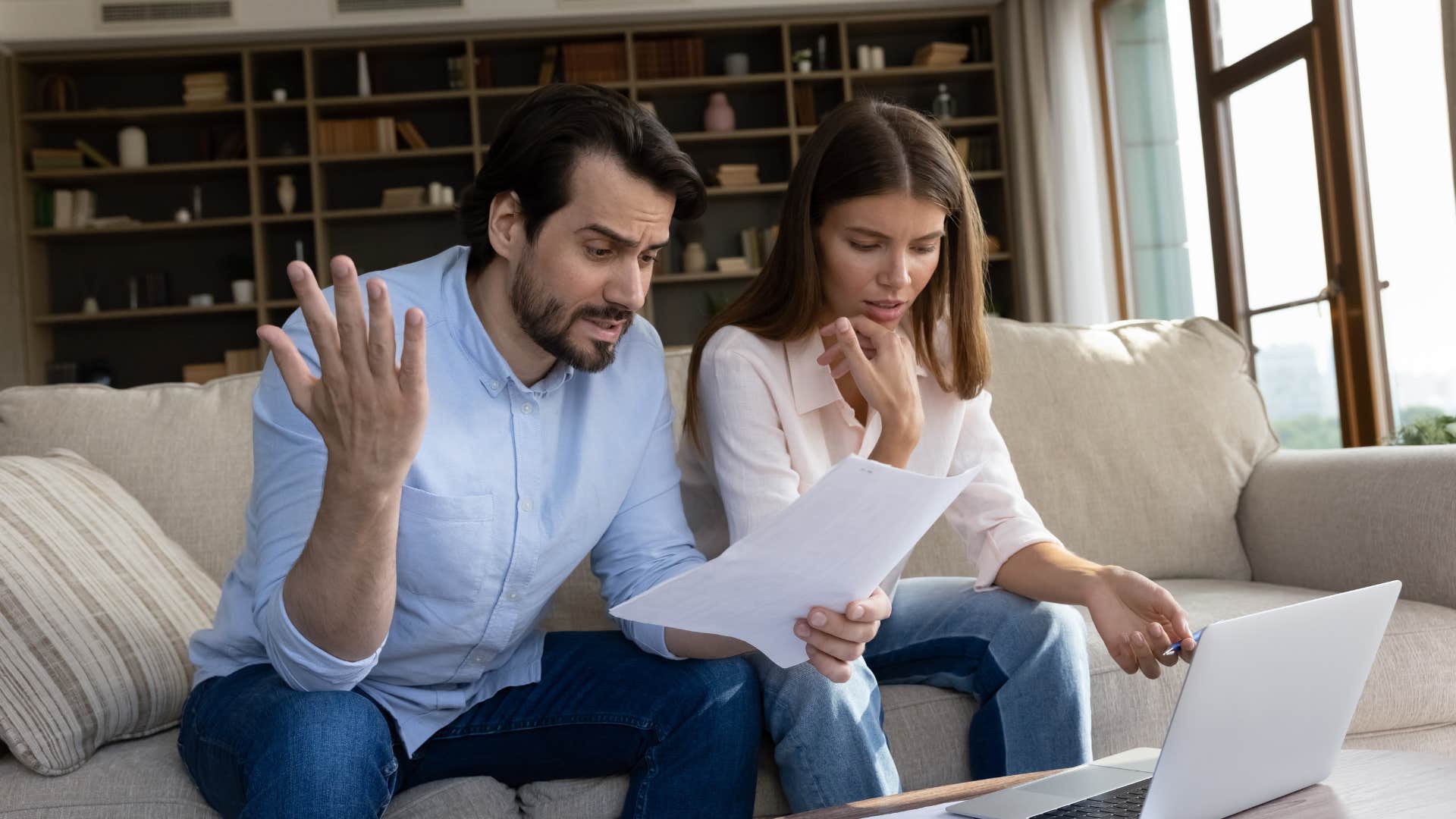 couple arguing about finances as secret that almost broke them