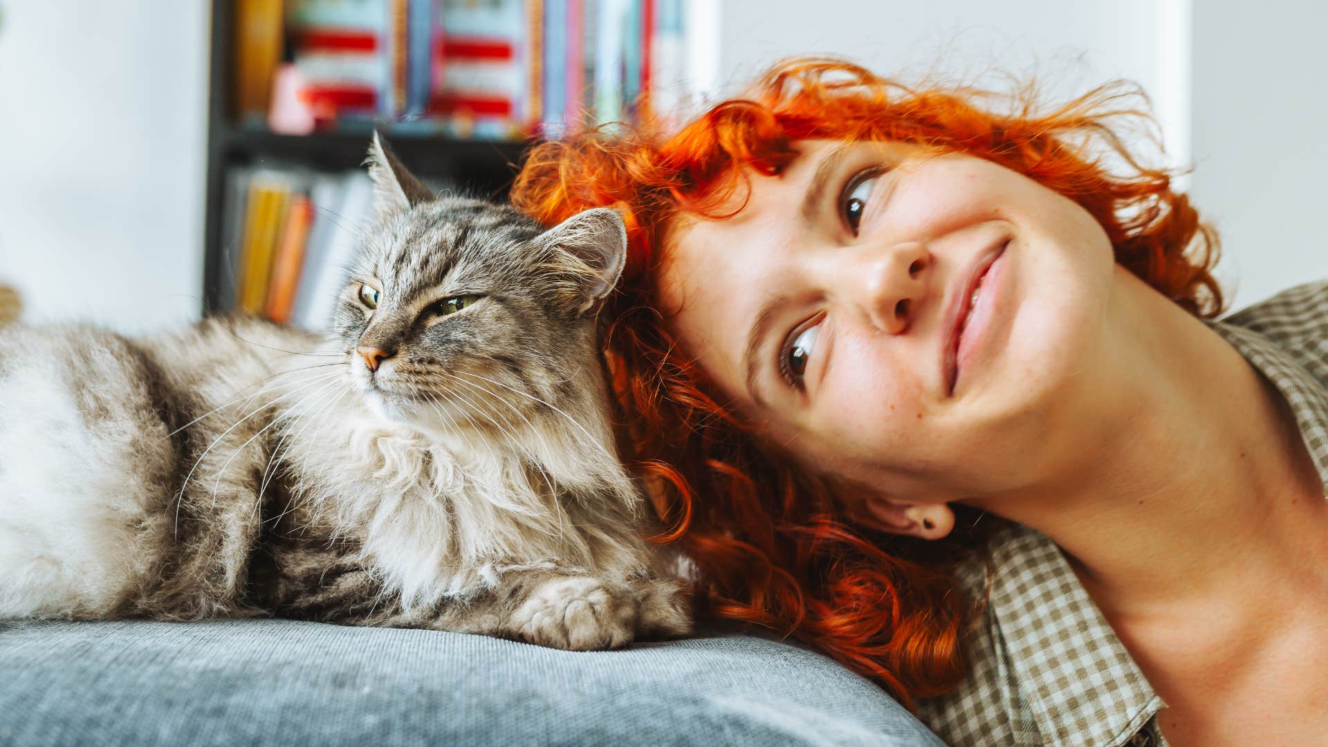 woman doing the crazy thing of having cats
