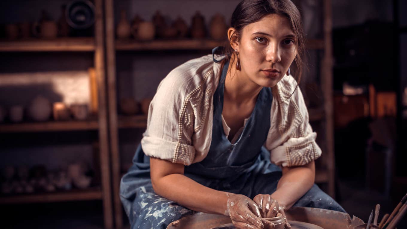Why Creative People Often Come From Broken Homes Creative woman doing pottery who came from a broken home