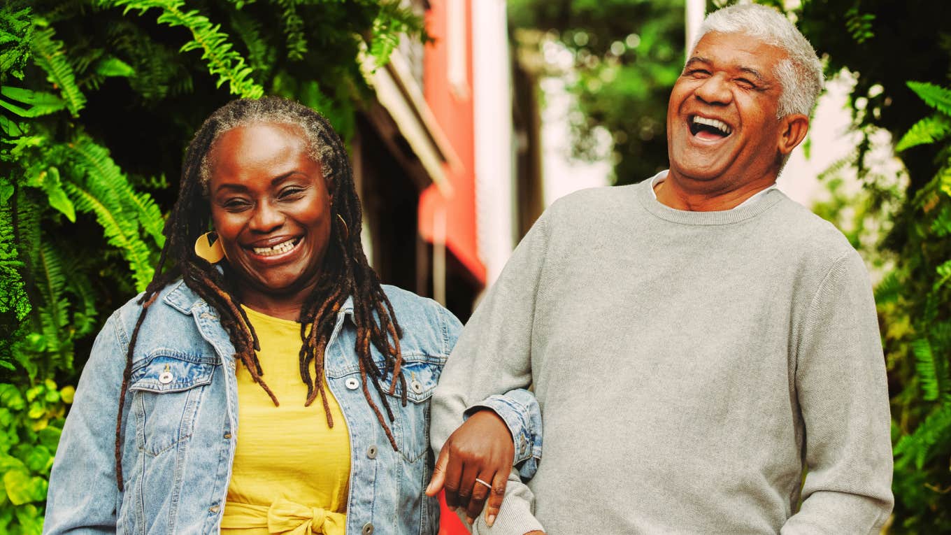 Daily Behaviors That Predict Lifelong Marital Happiness, According To Psychology Couple experiencing lifelong marital happiness.