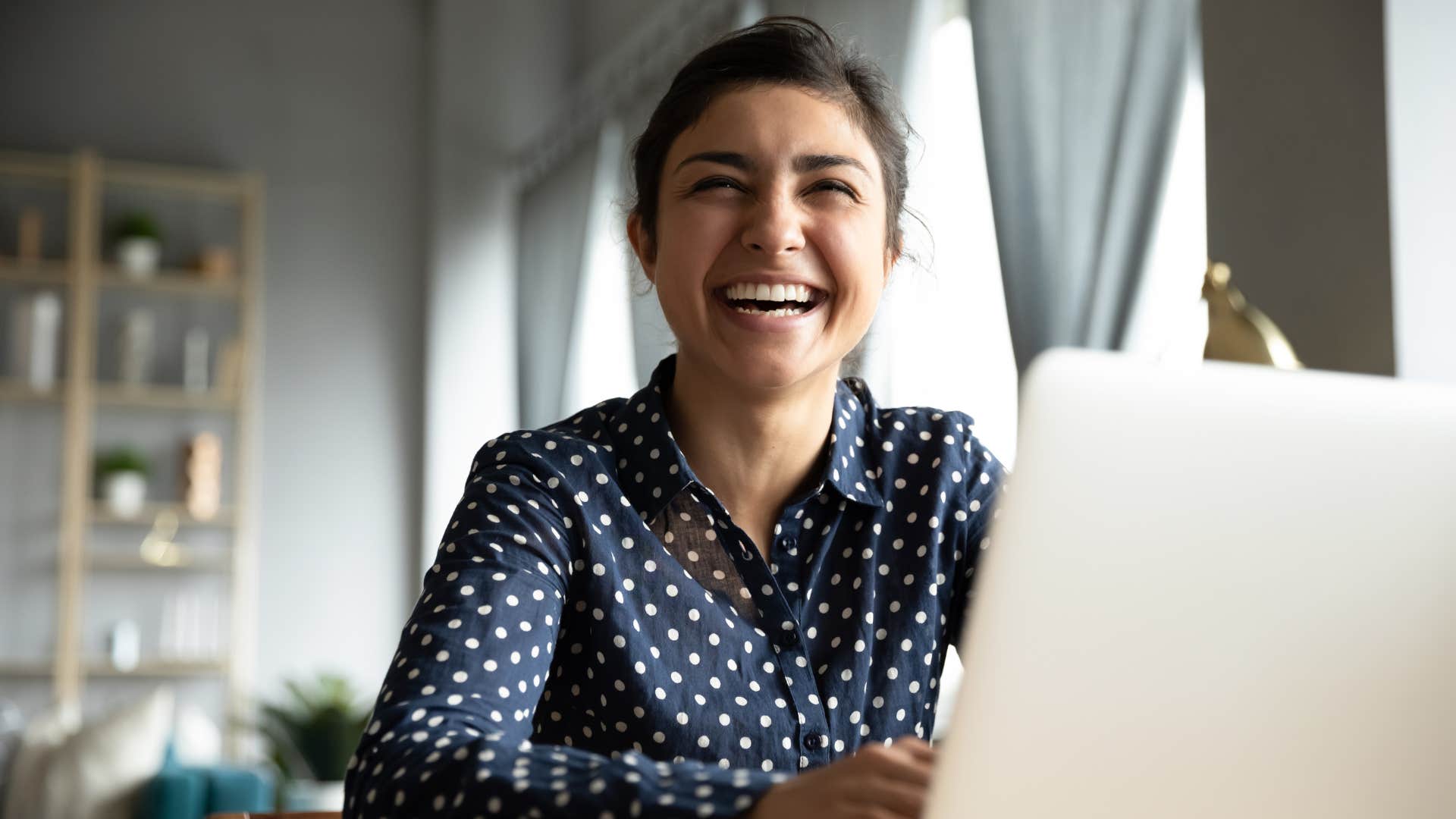 woman using humor to avoid facing real emotions