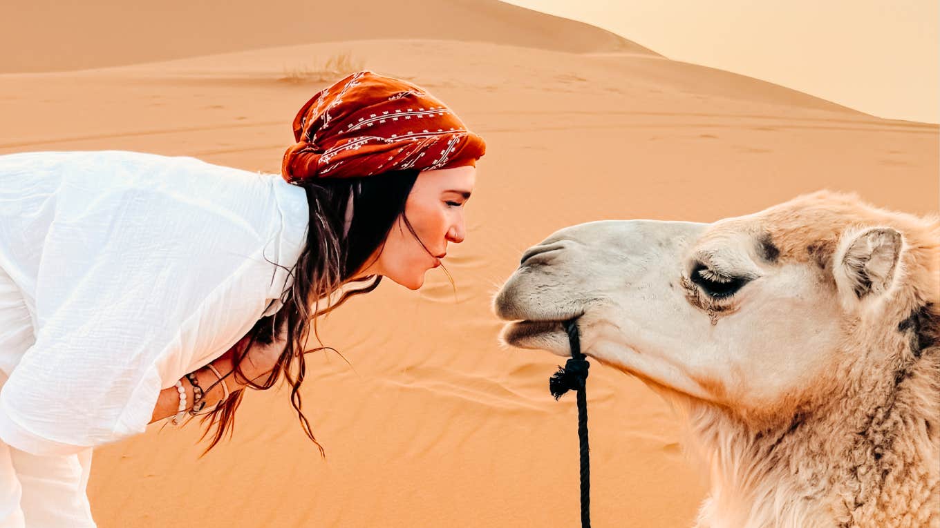 I Ditched Therapy for Camel Rides — And It Healed My Divorce Faster Woman ditching therapy for camel rides to heal from divorce.