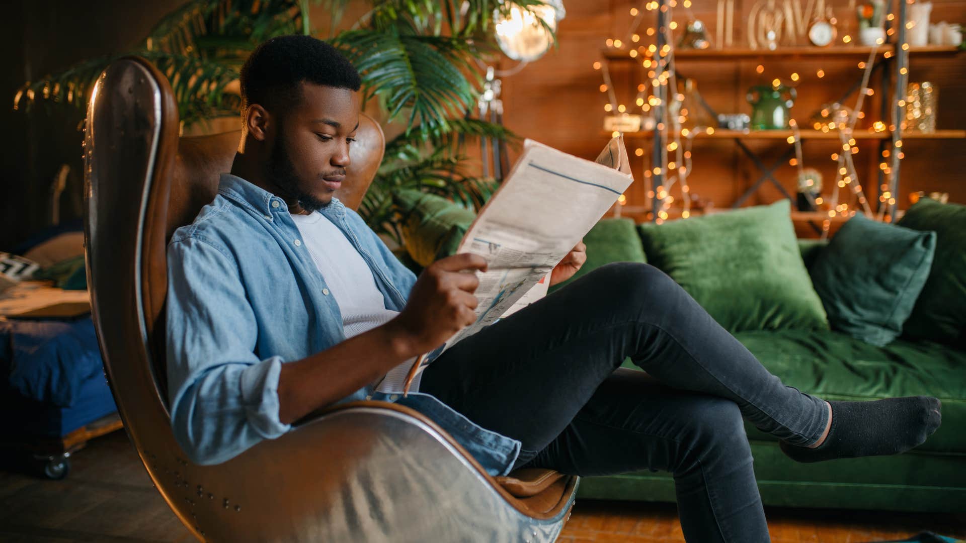 man making himself aware of what's going on in the world