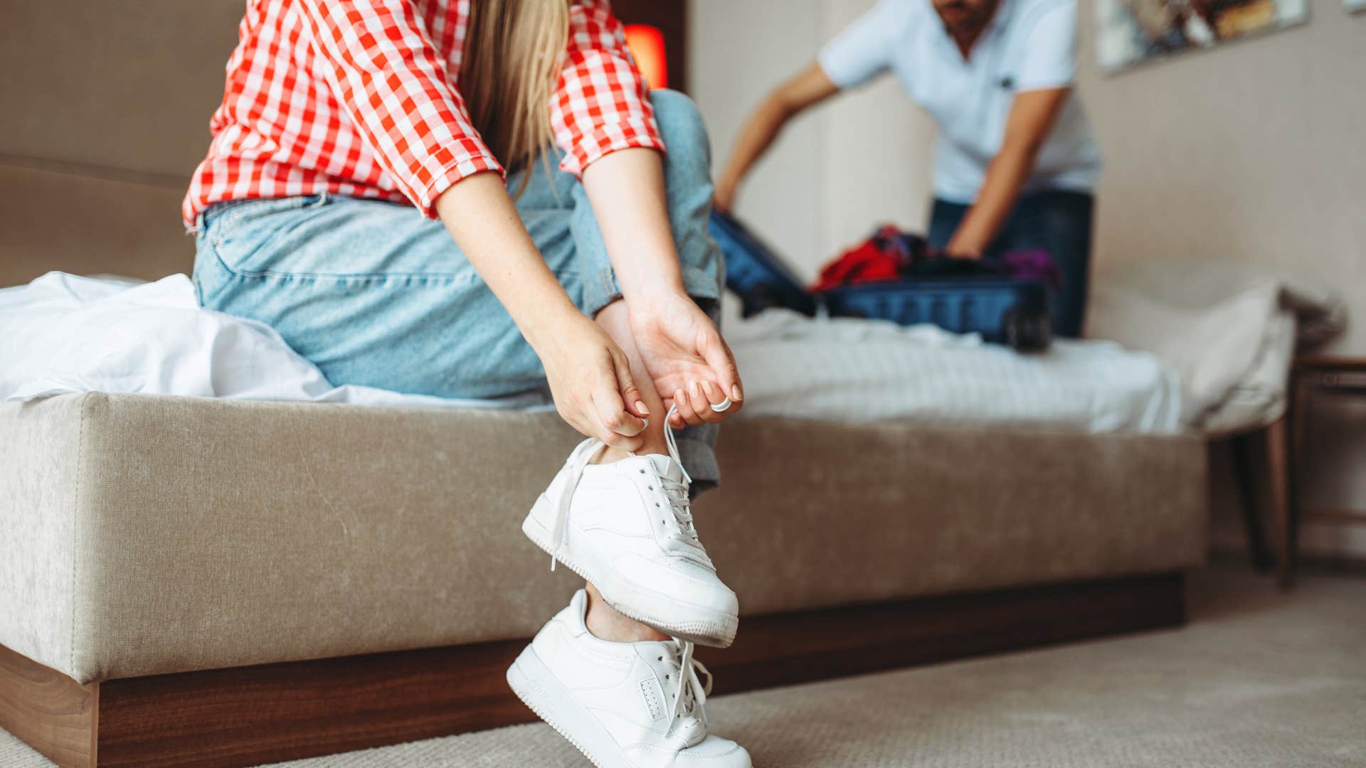 girl putting on house shoes