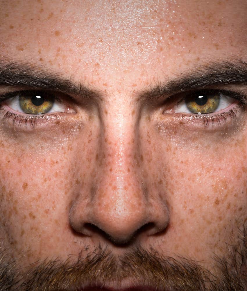 Narcissistic man stares with laser focus