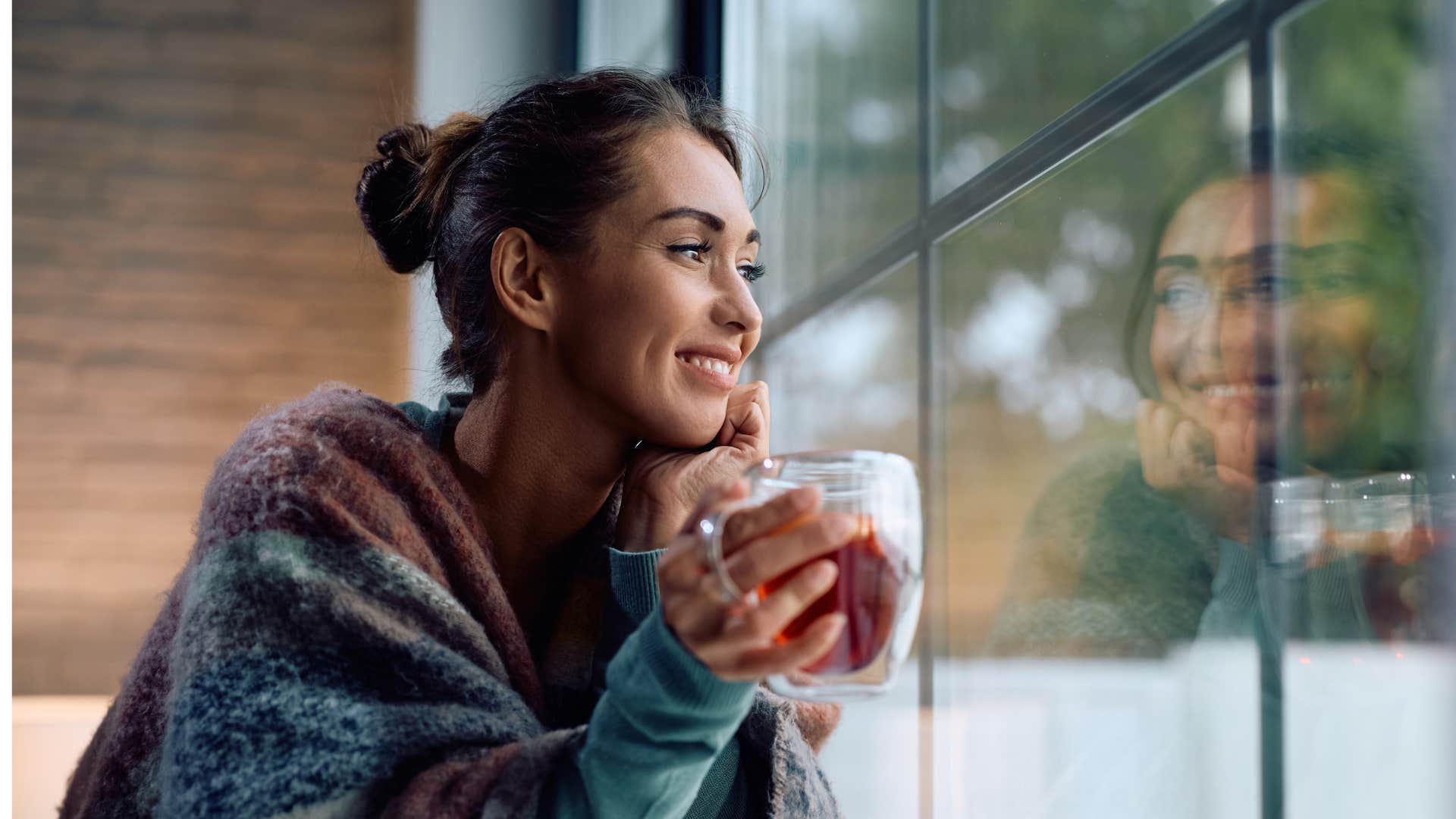 Woman positively reflects as evening habit