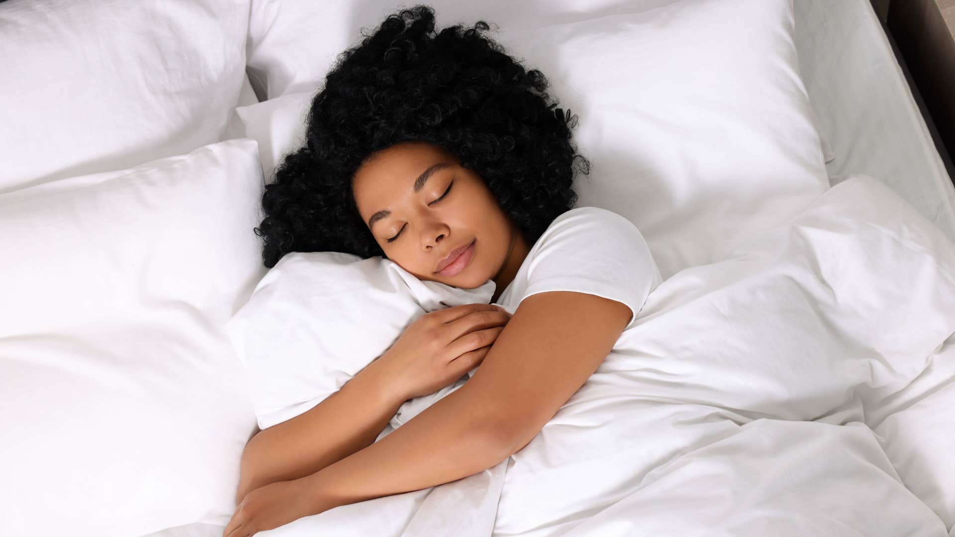 Woman falls sleep with intention as evening habit