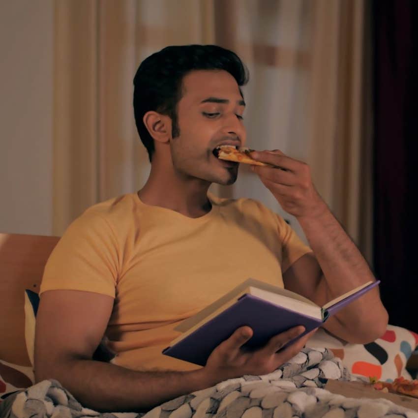 man making the everyday mistake of eating at the wrong times