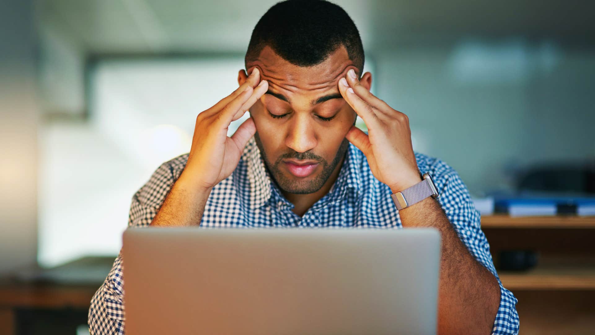 man managing extreme work-related stress