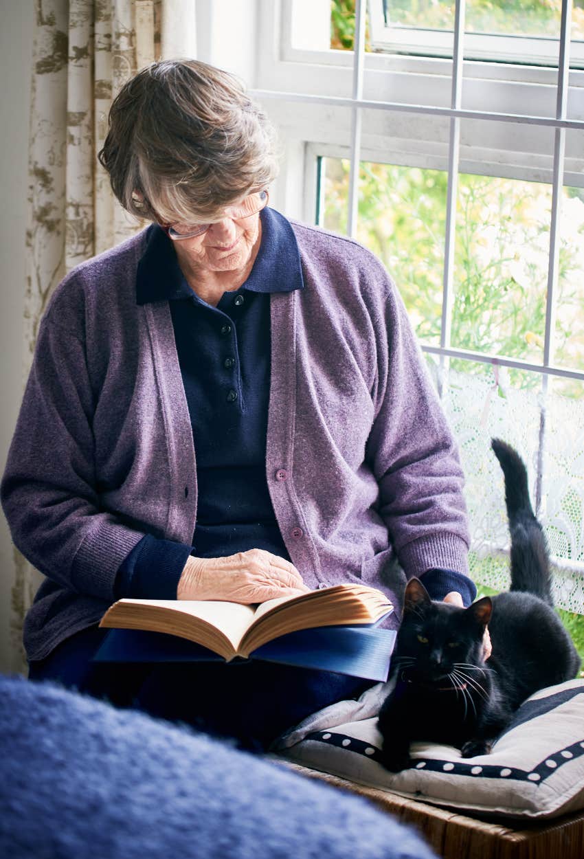 introverted woman with cat
