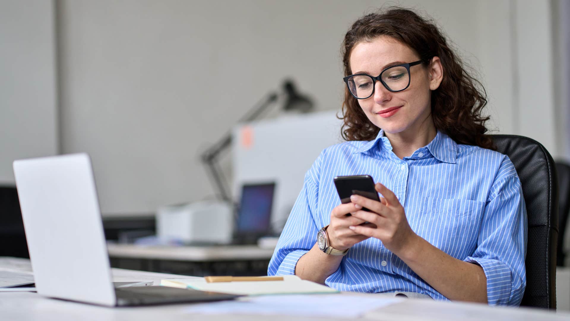woman texting from work that shes busy
