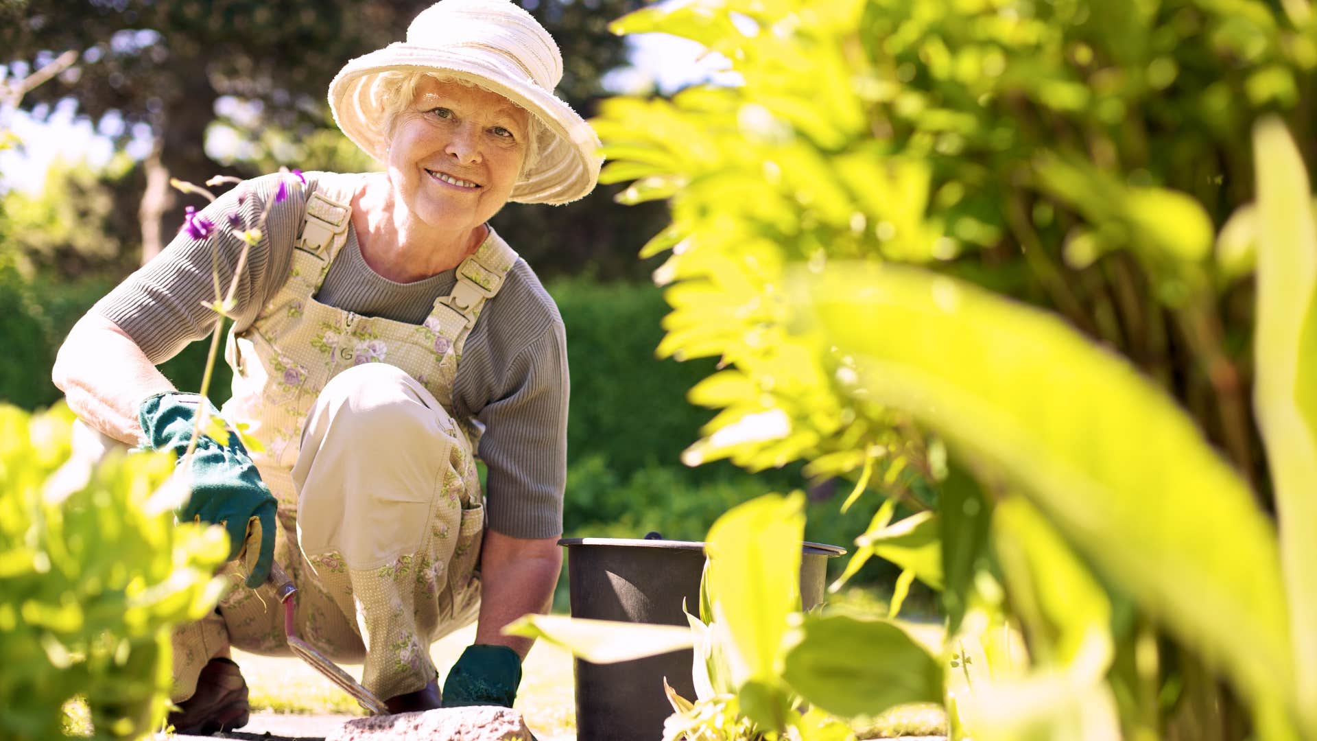 older woman gardening and growing her own food