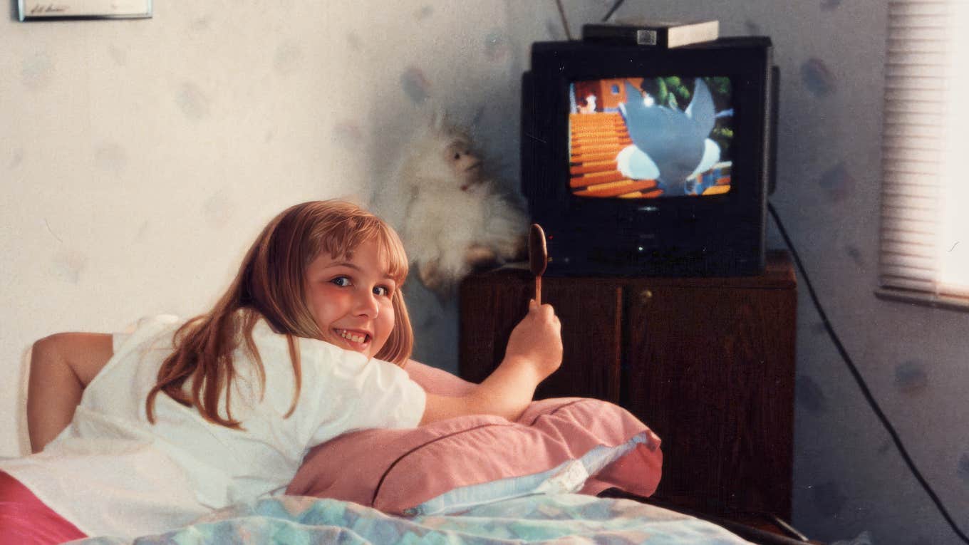 Gen-X Movies We Loved As Kids That Have Aged Horribly Gen-X watching movies that have aged horribly, in bedroom as a child