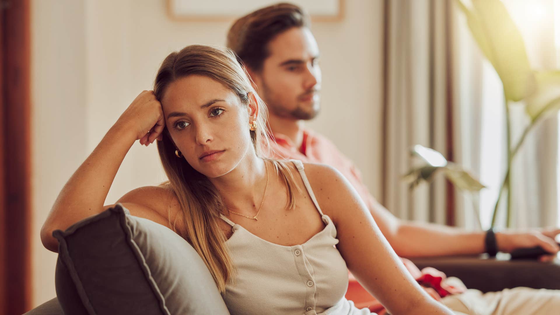 woman with man who is defensive quietly ruining their marriage