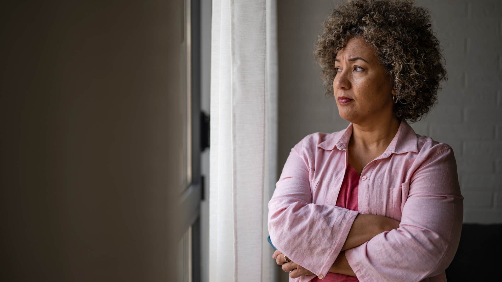 older woman going through a life change looking solemn