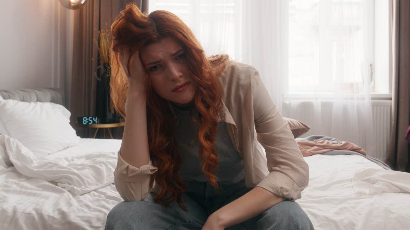 The One Item In Your Bedroom You Think Is Clean That's Literally Filled With Germs Woman realizing there's one item in her bedroom that's filled with germs