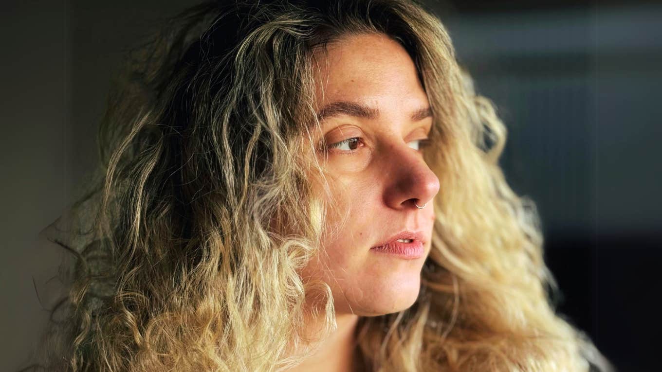 These Life Decisions Have the Power to Derail Your Entire Future, According to Experts Person making life decisions that can derail her entire future.