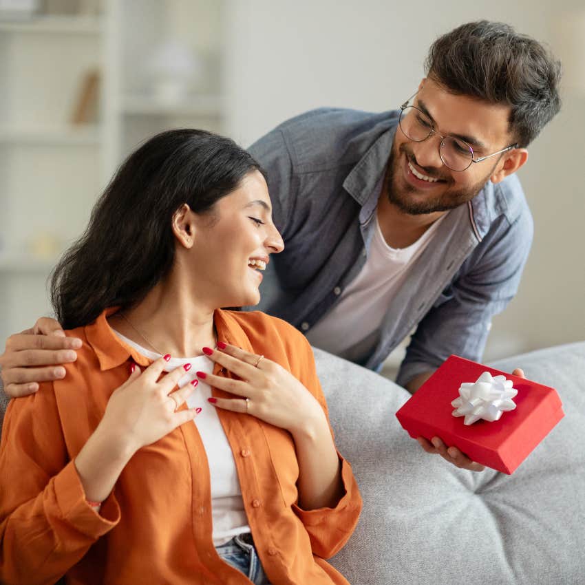 man who is a great husband giving a gift