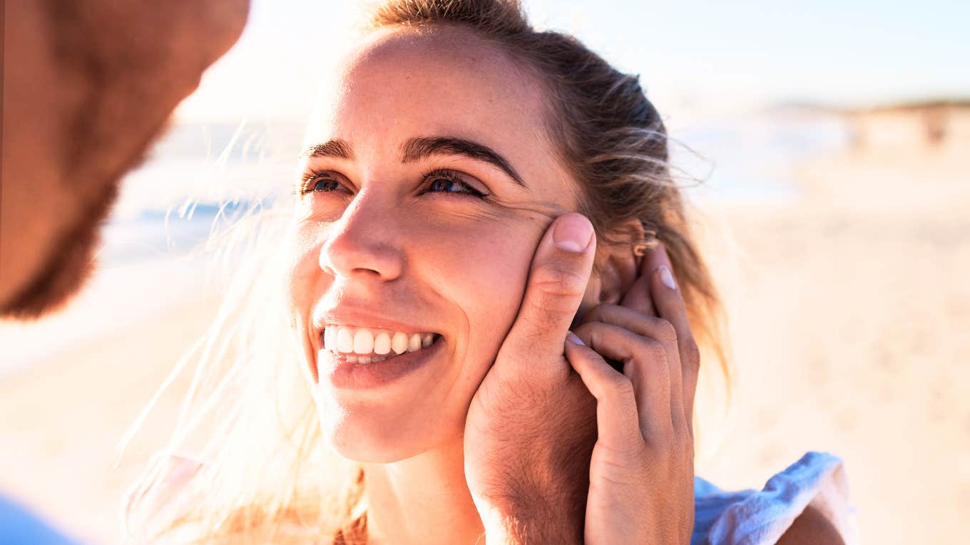 Little Things That Make Men Think ‘I Could Marry Her,’ According To Psychology Man looking at woman thinking I could marry her.
