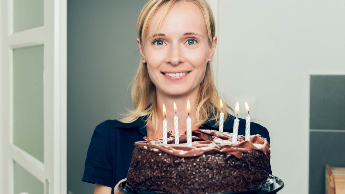 Man Disappointed With Birthday Cake His Girlfriend Made Girlfriend holding the birthday cake she made that her boyfriend didn't like