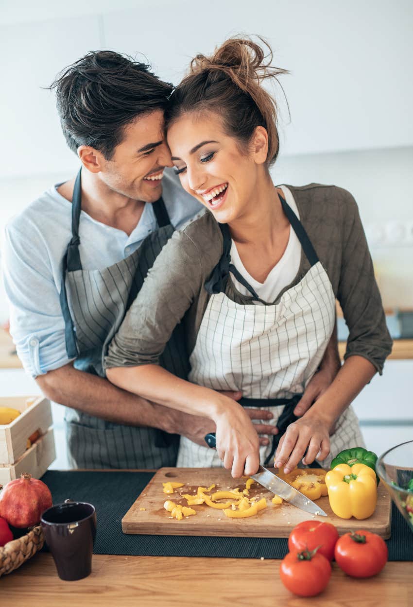 man who shares the cooking with the woman he loves and likes