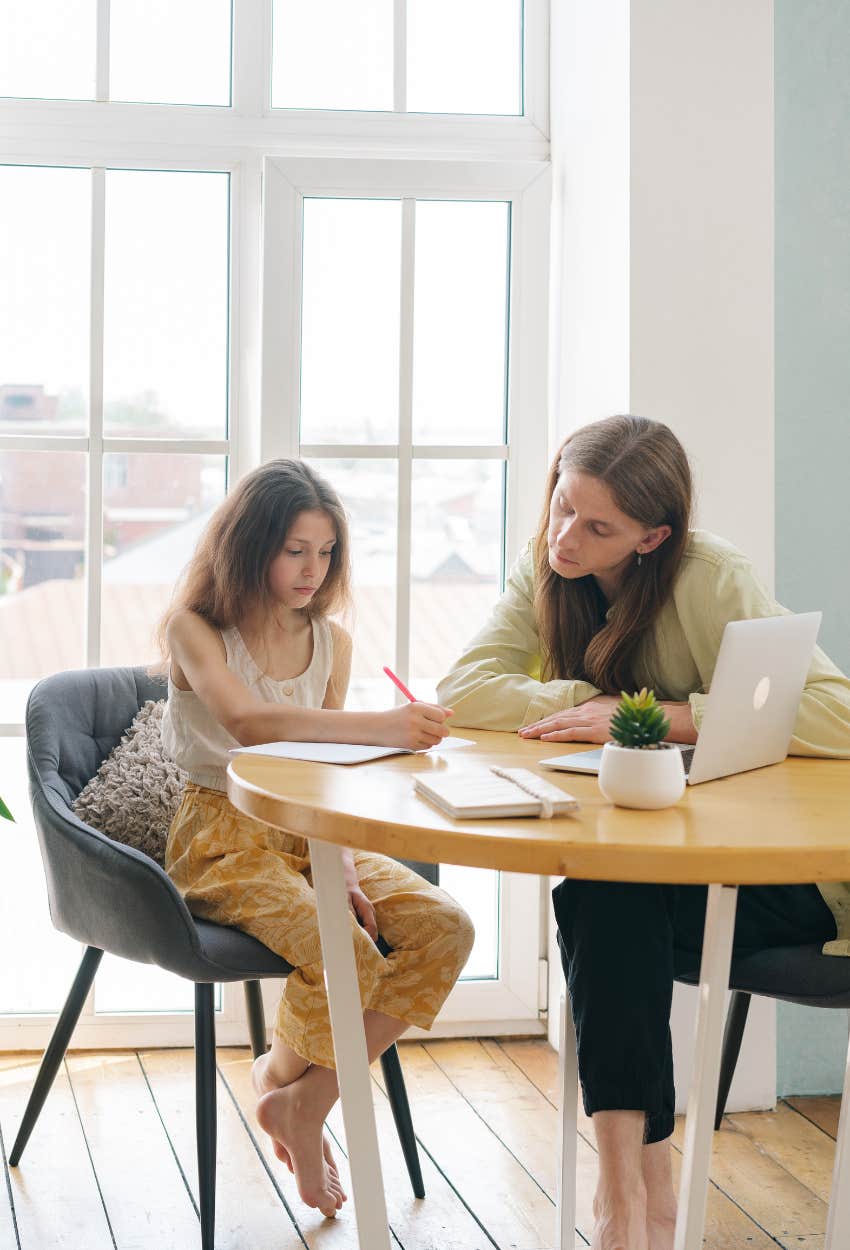 Nagging mom helping daughter with homework will help her become successful