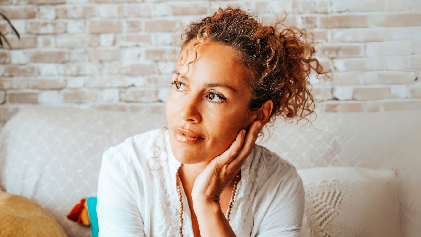 No Dates, No Intimacy, No Romance — My Year of Total Emotional Reset Woman reflecting on year of total emotional reset.