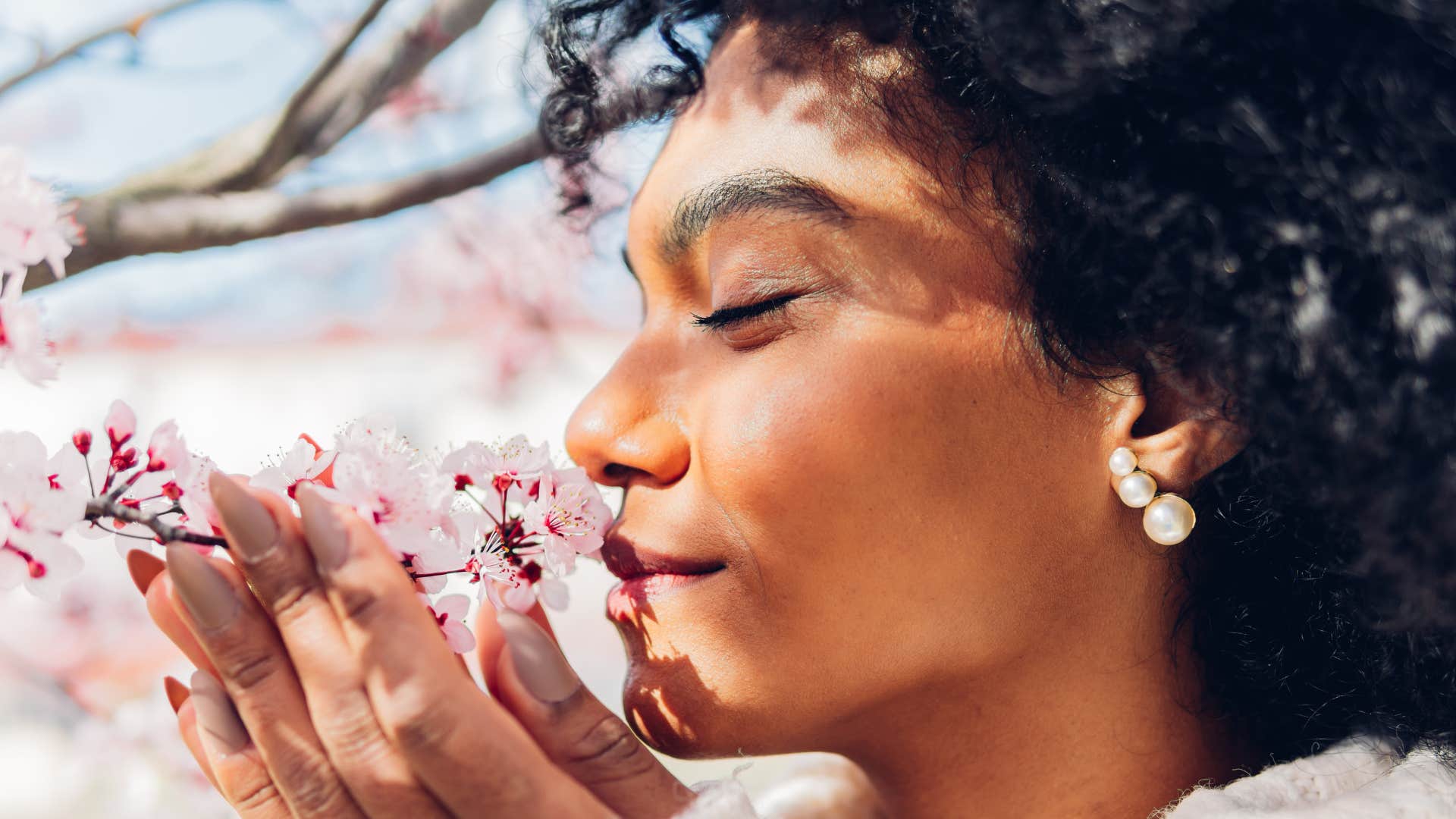 a woman is drawn to a mysterious flower