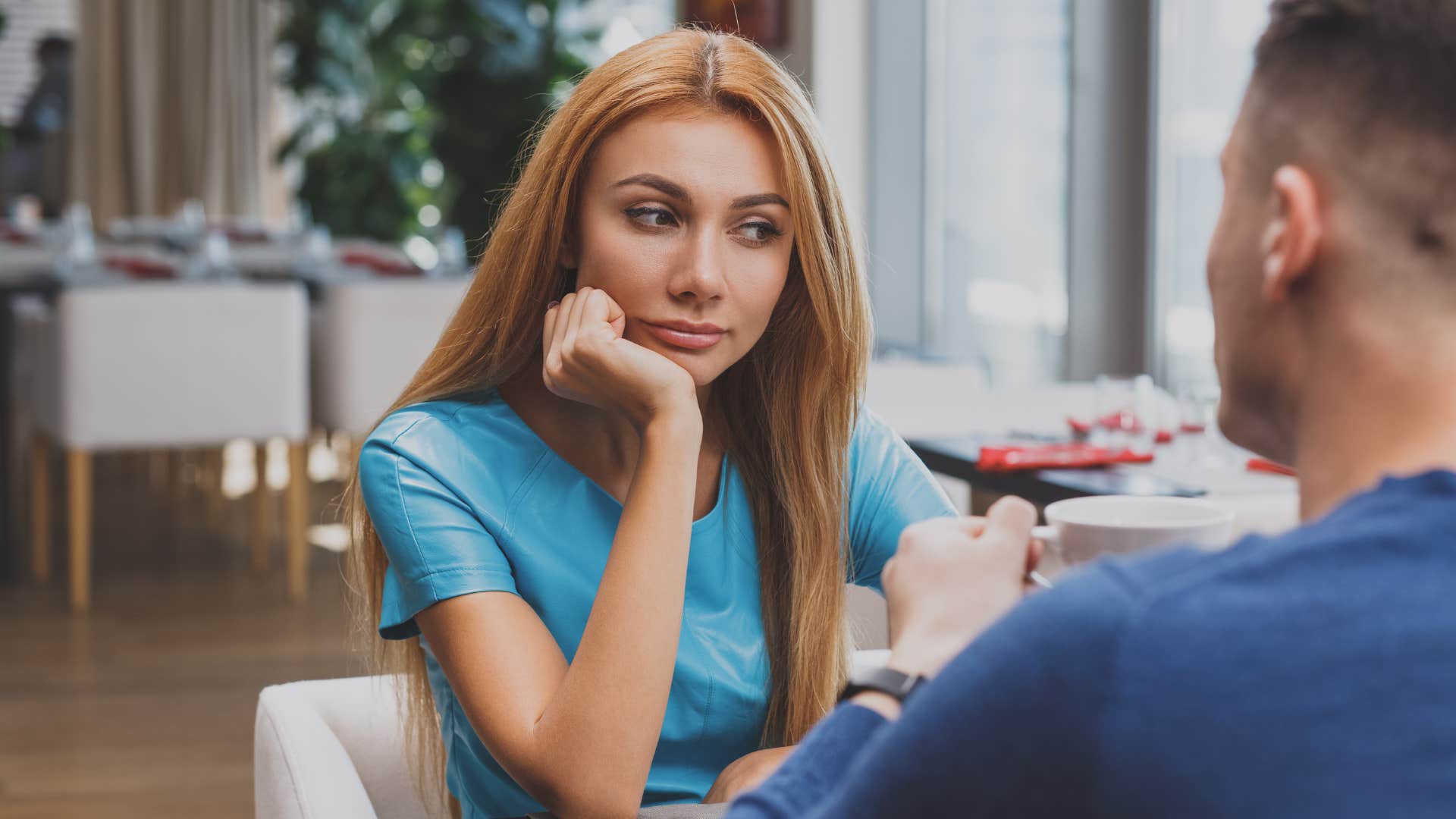 a woman zones out mid conversation