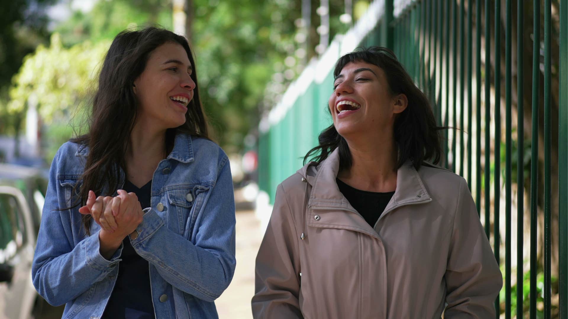 a woman gossips with her friend about others not realizing she will gossip about her eventually