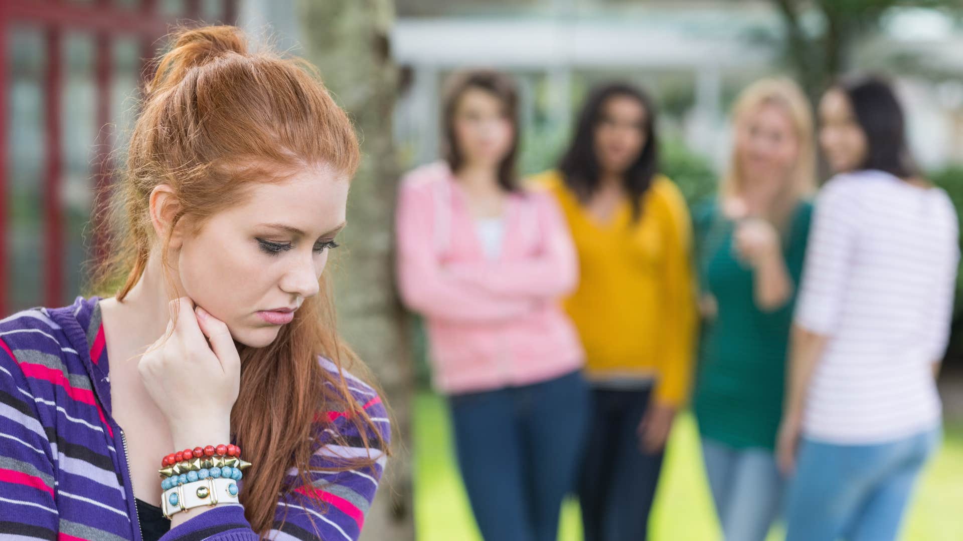 a young girl finds out that her friends are talking about her behind her back