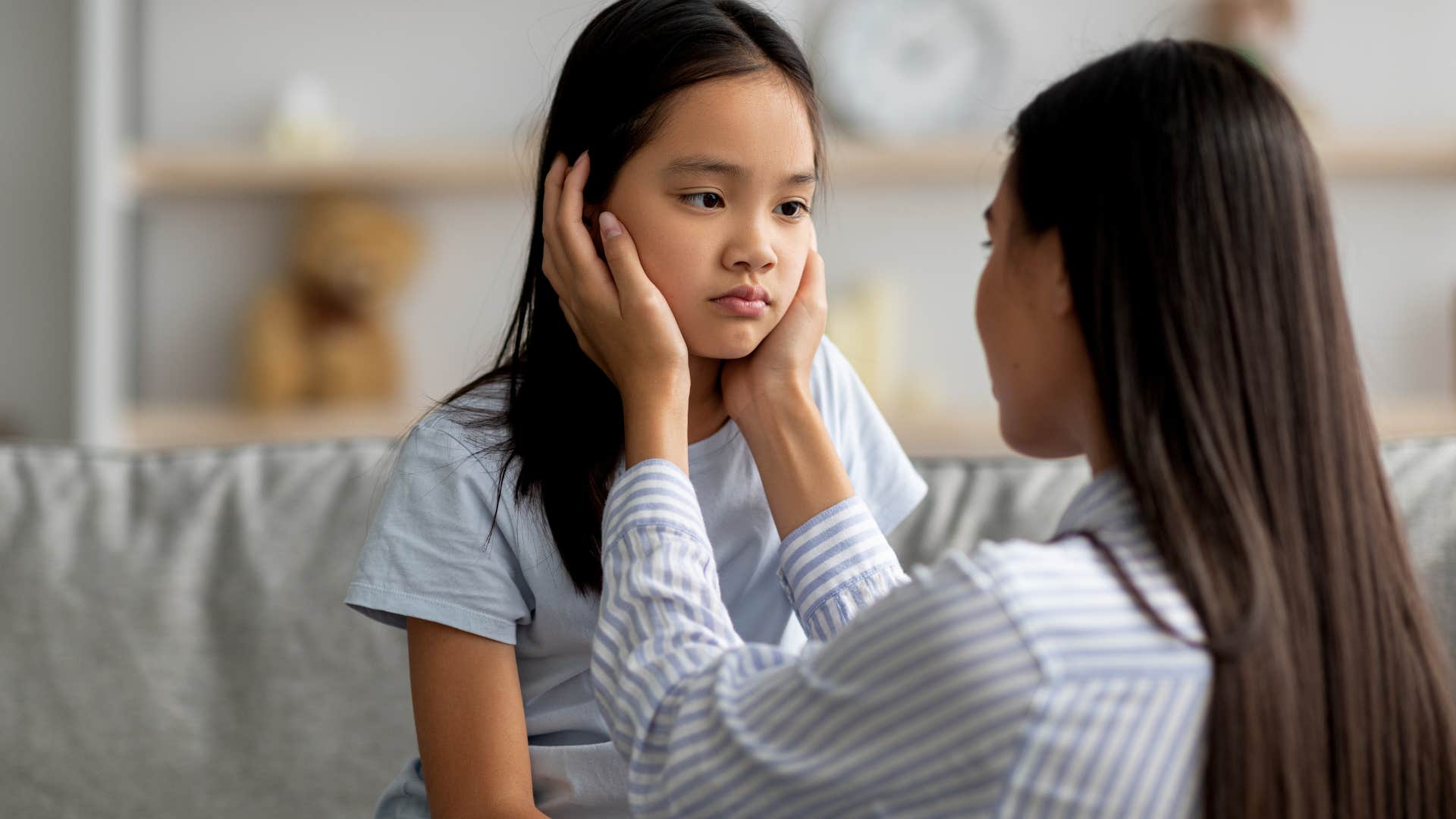Woman talking down to her daughter