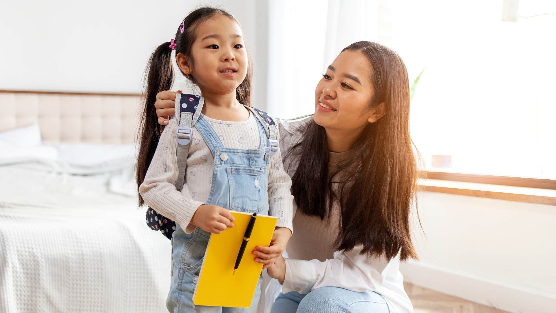 a mother praises her daughter for making an effort in school