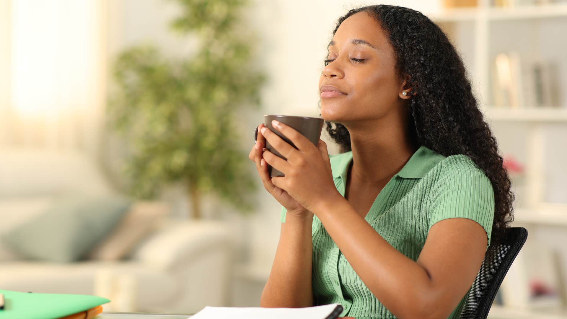 Tea drinker focuses on ritual