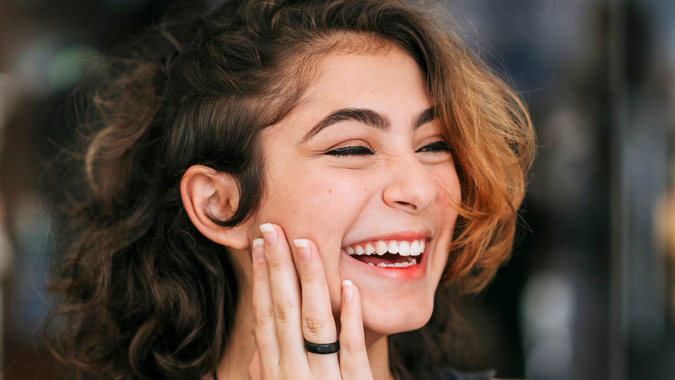 People Who Seem Happier Than Everyone Else Often Prioritize These Things, According to Experts Person seems happier than everyone else.