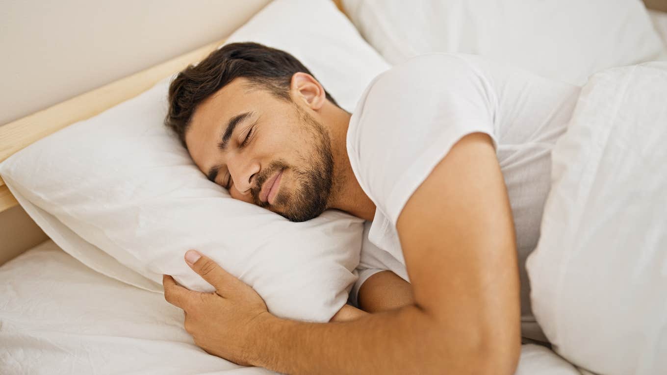 People Who Sleep On Left Side Of The Bed Display These Personality Traits man sleeps on left side of the bed and displays these personality traits