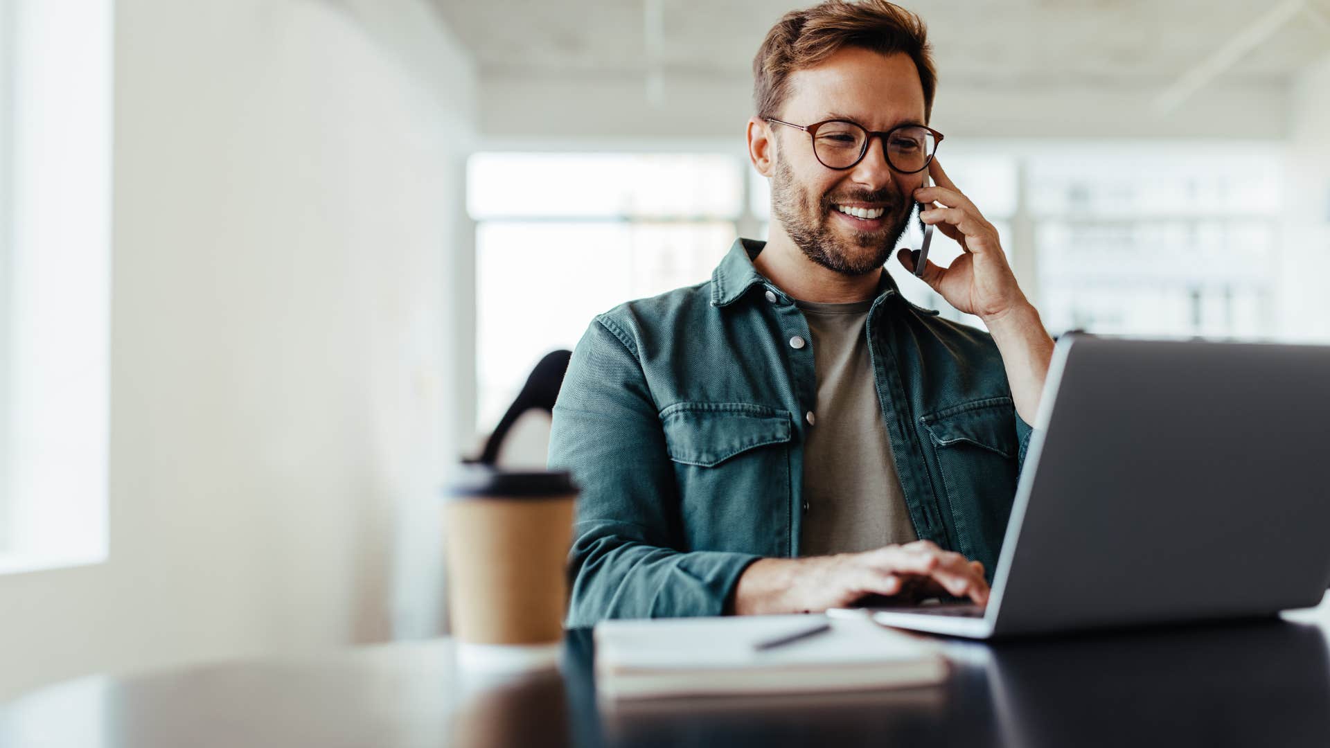 man with high standards for their energy working on laptop