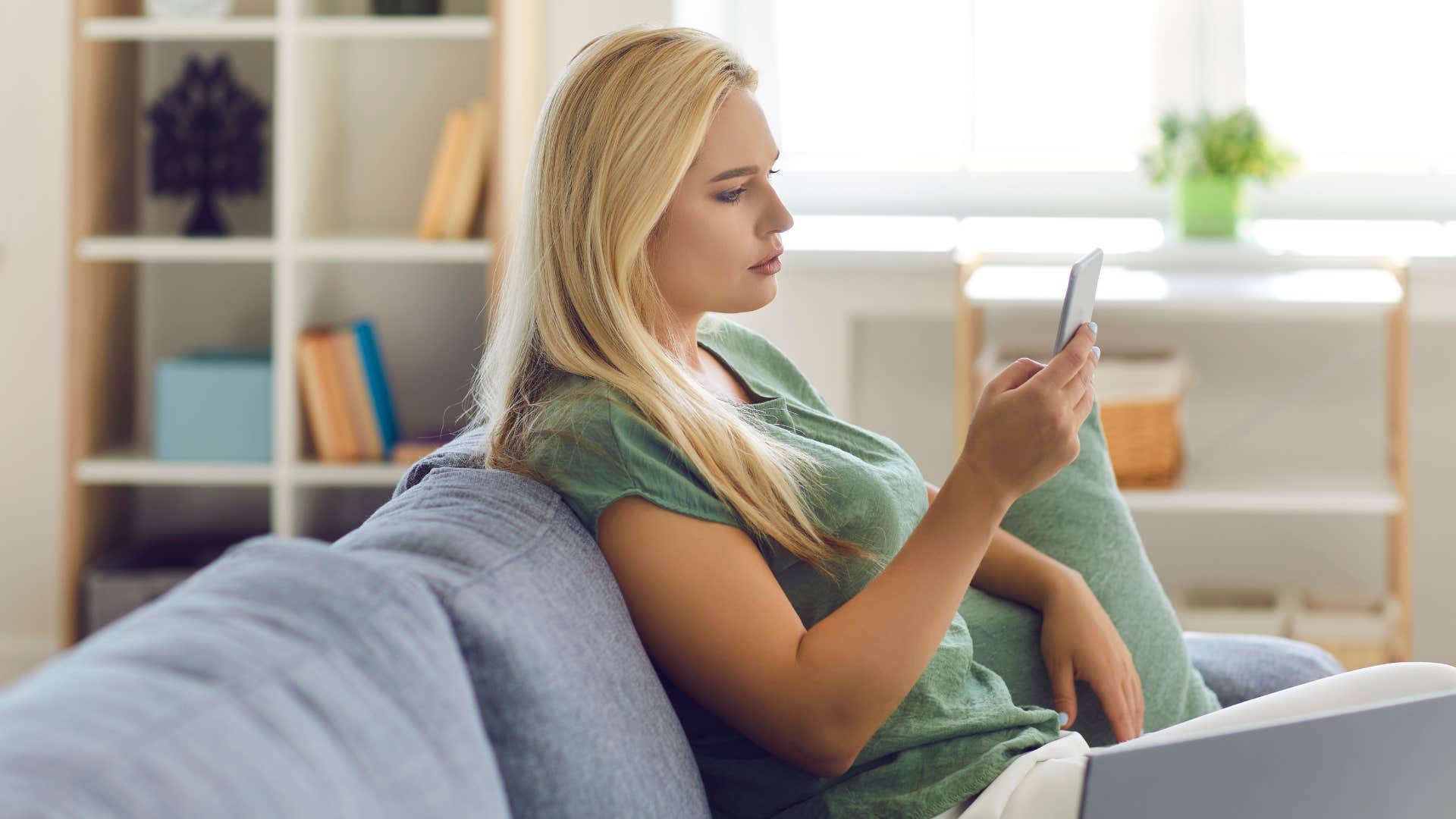 a woman realizes that the man she is texting is not as emotionally invested in her