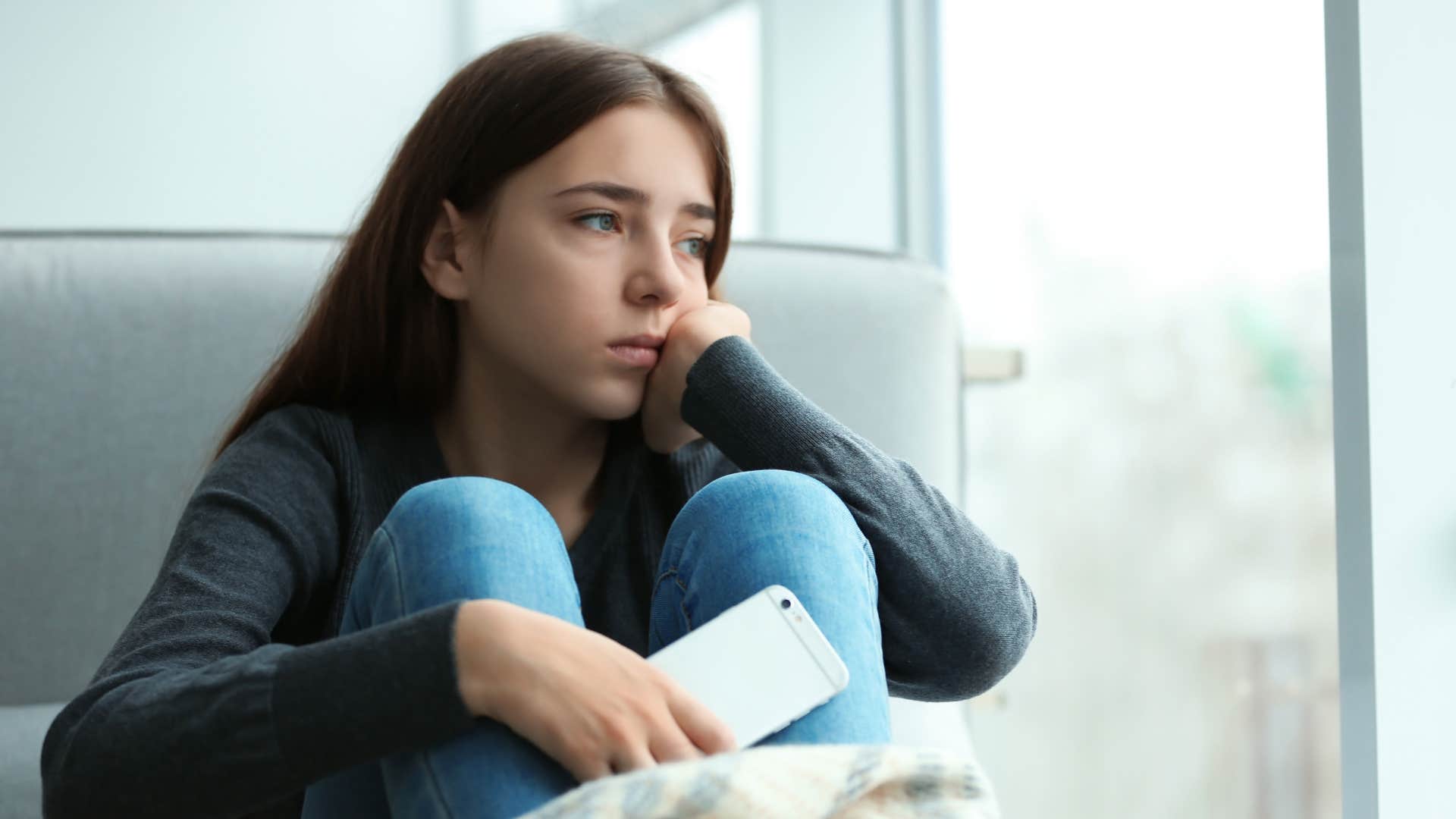 a young girl struggles with her mental health and avoids texting people